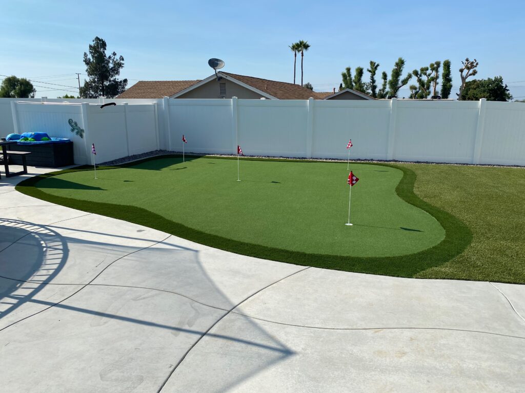 Custom backyard putting green designed and installed by Green Forever Turf Texas