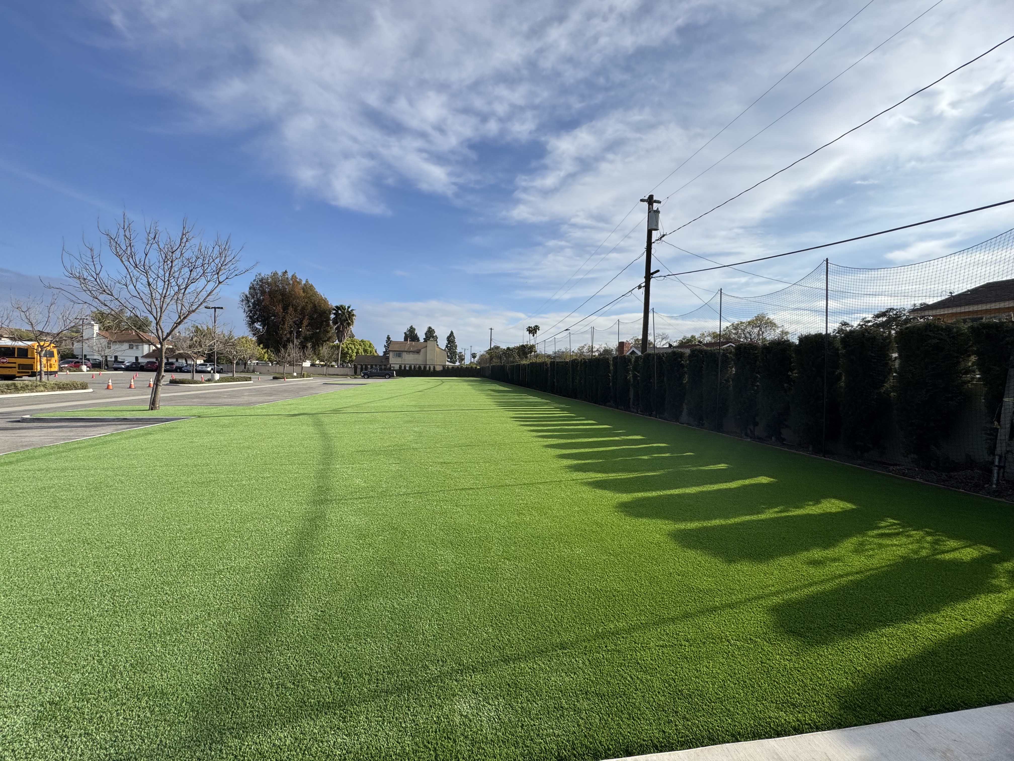 Commercial parking lot median - Green Forever Turf Texas