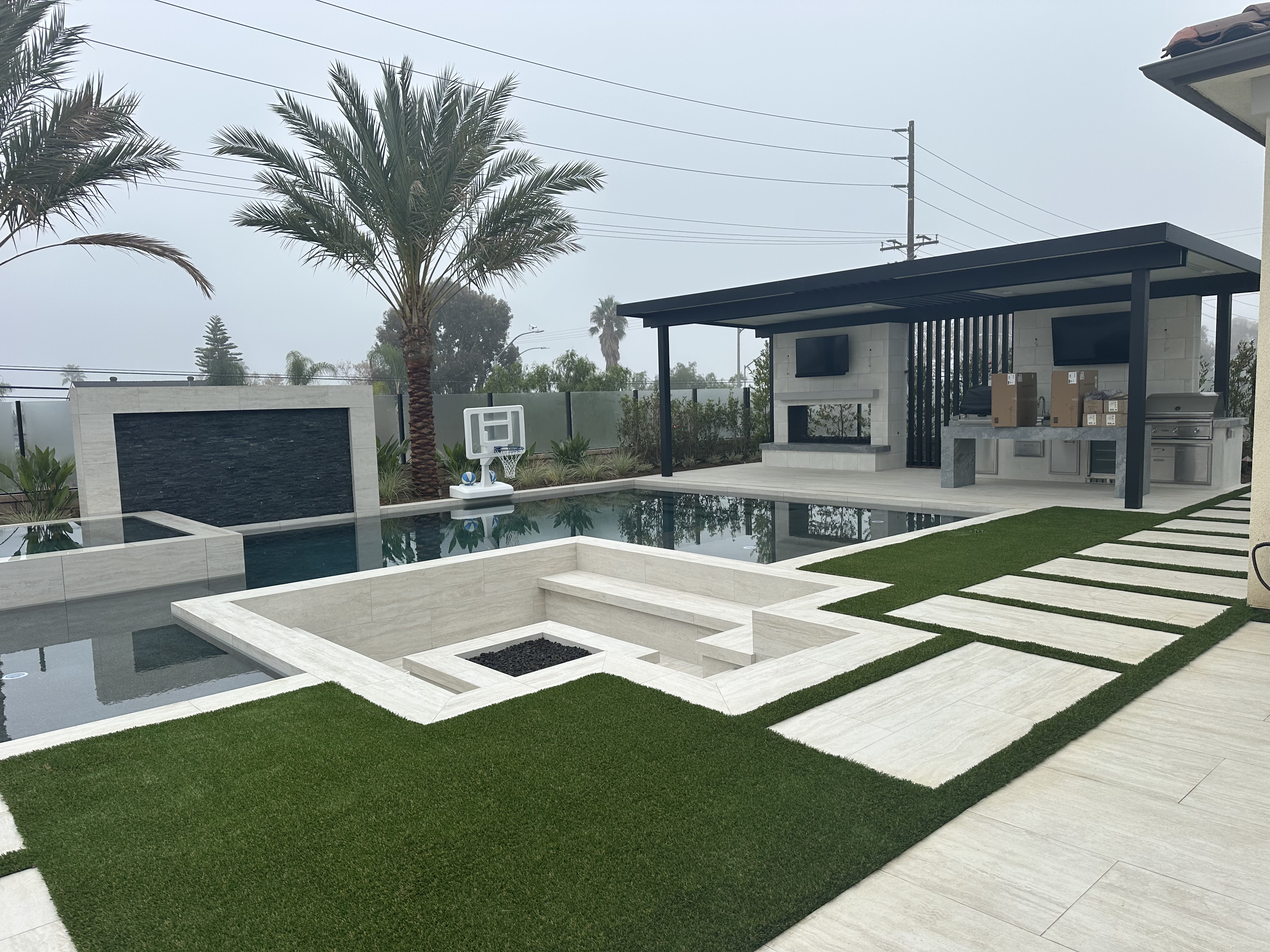 Pavers and stone poolside patio steppers - Green Forever Turf Texas