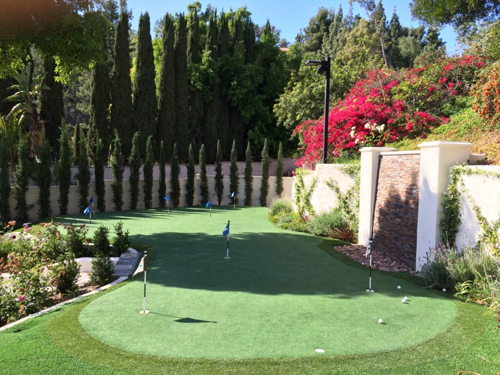 Luxury backyard putting green with multiple holes