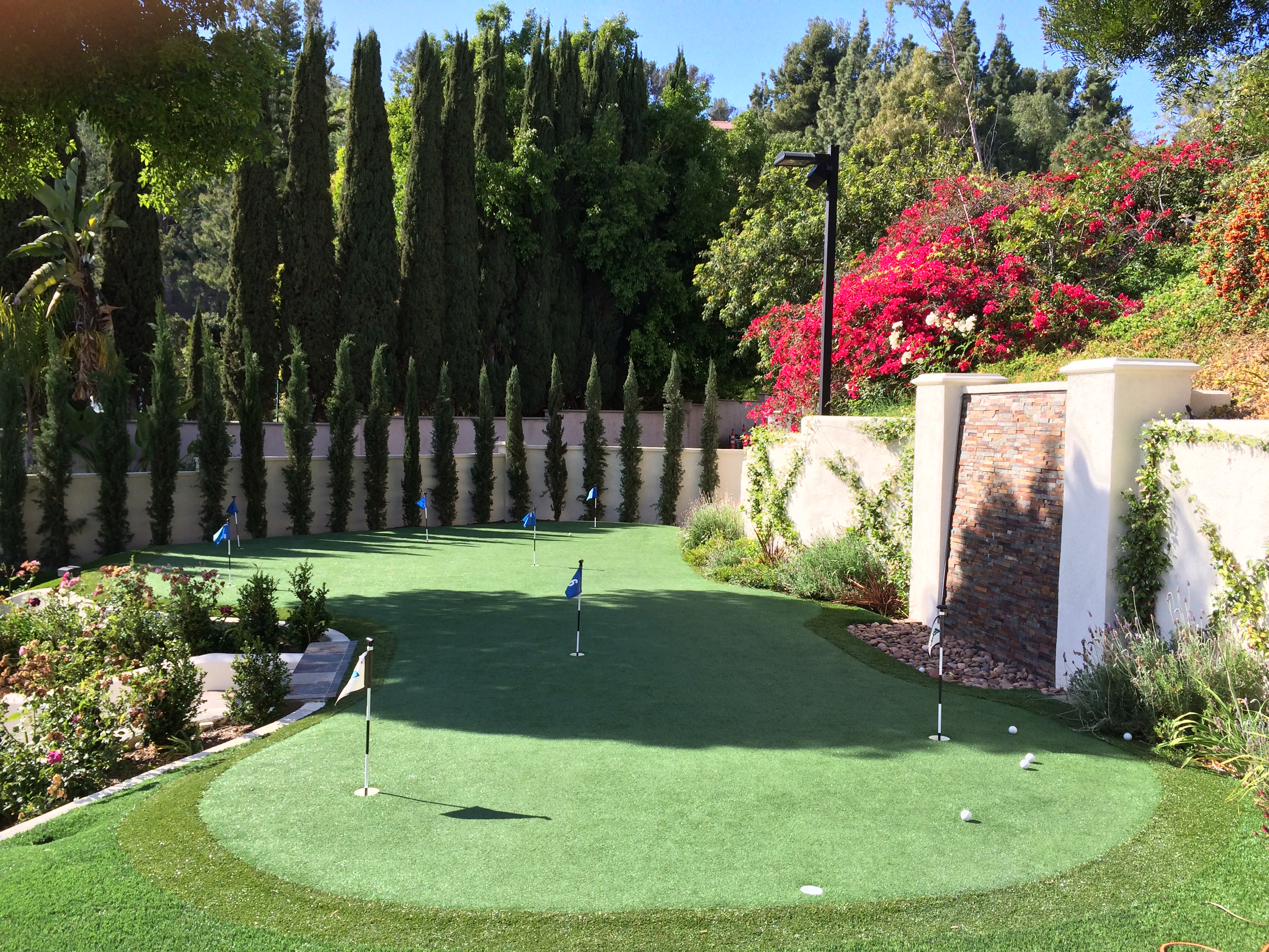 Luxury backyard putting green installation - Green Forever Turf Texas