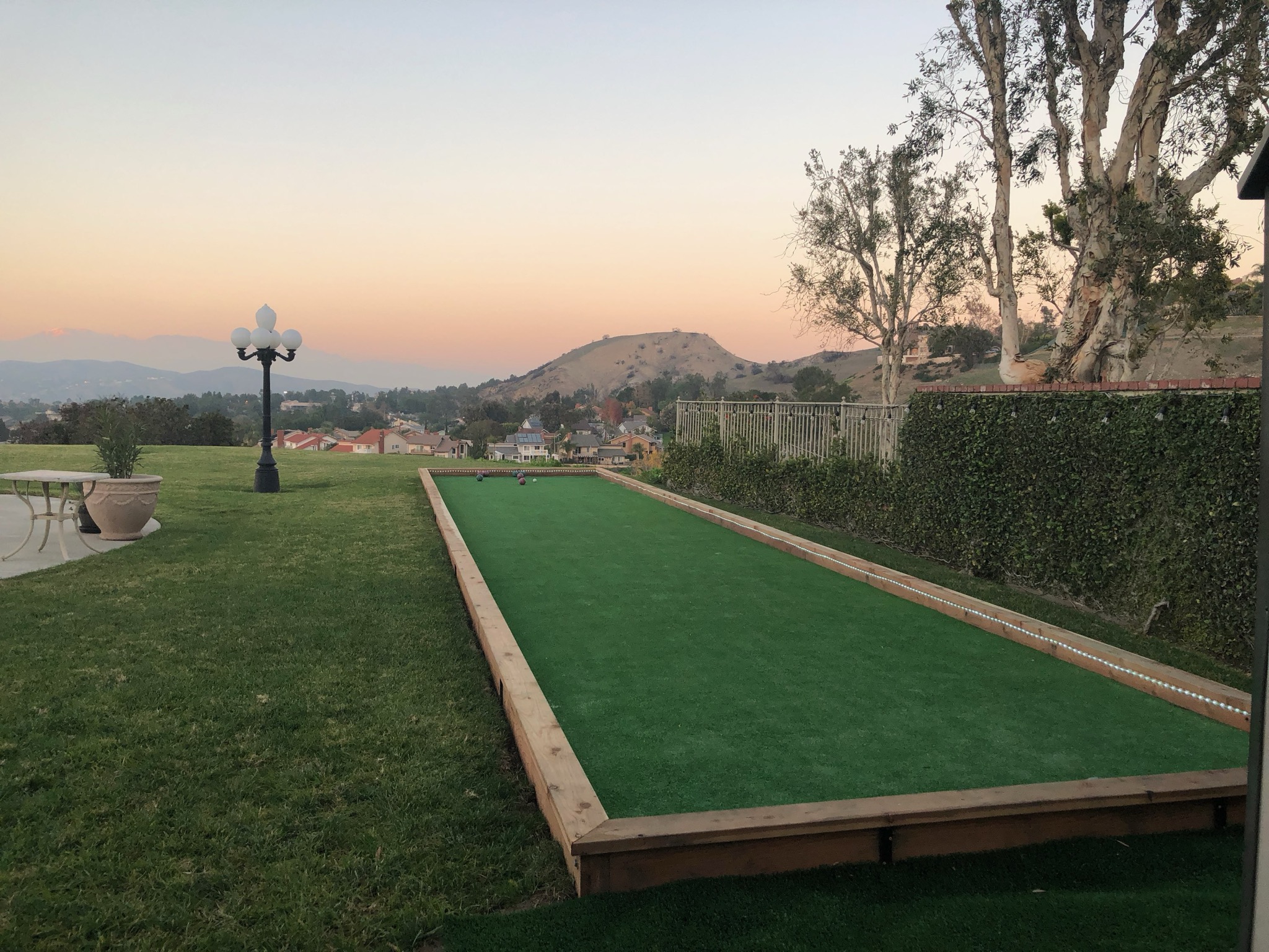 Residential backyard bocce ball court - Green Forever Turf Texas